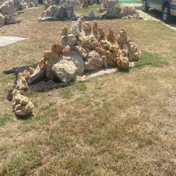 Stone dinosaur sculpture/statue