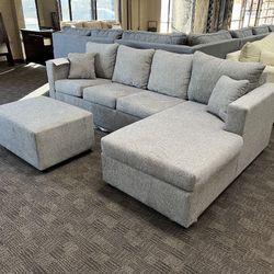 New Grey Sectional And Ottoman 