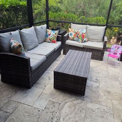 couch with love seat and 2 chairs with 1 storage