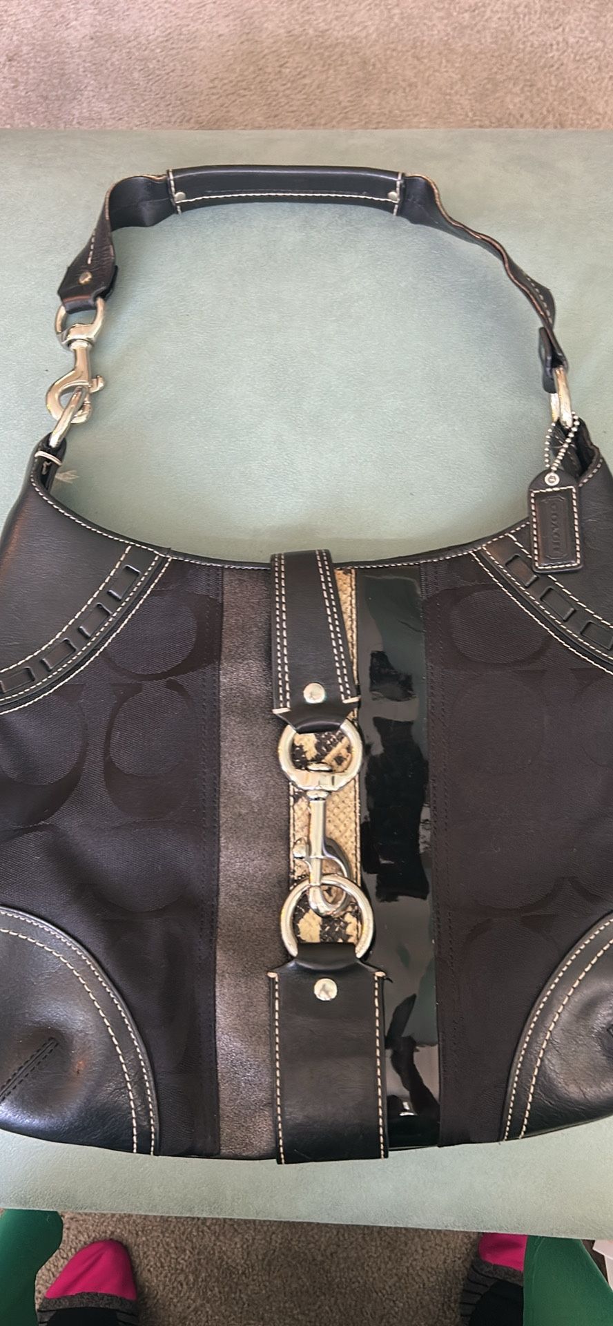 Classic Coach Black Shoulder Bag With Hook Closure. Beautiful and elegant new condition.