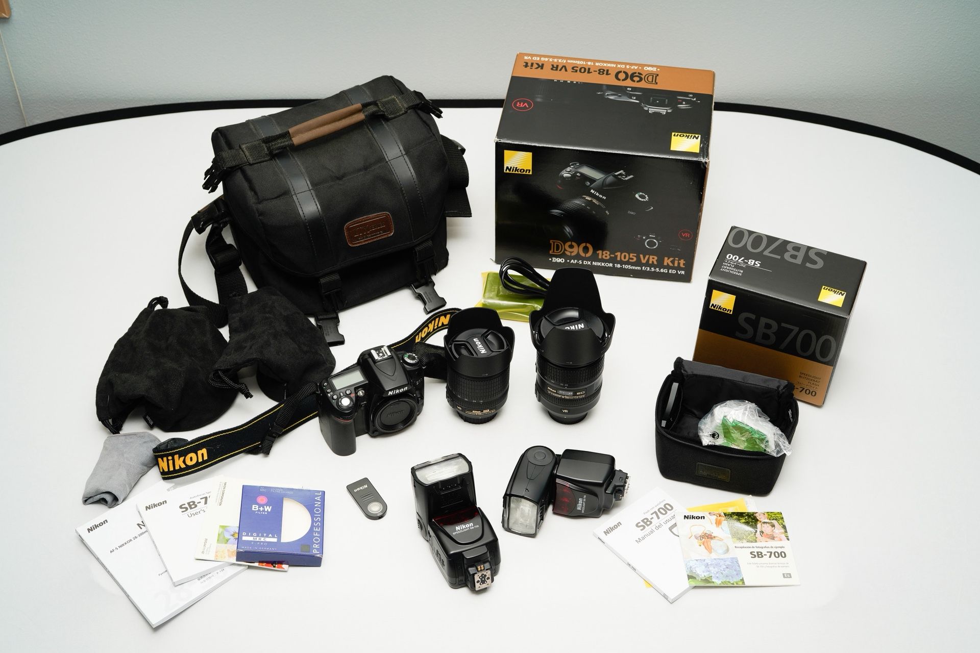 Nikon D90, 18-105mm, 28-300mm, 2 Flashes SB-700, extras.