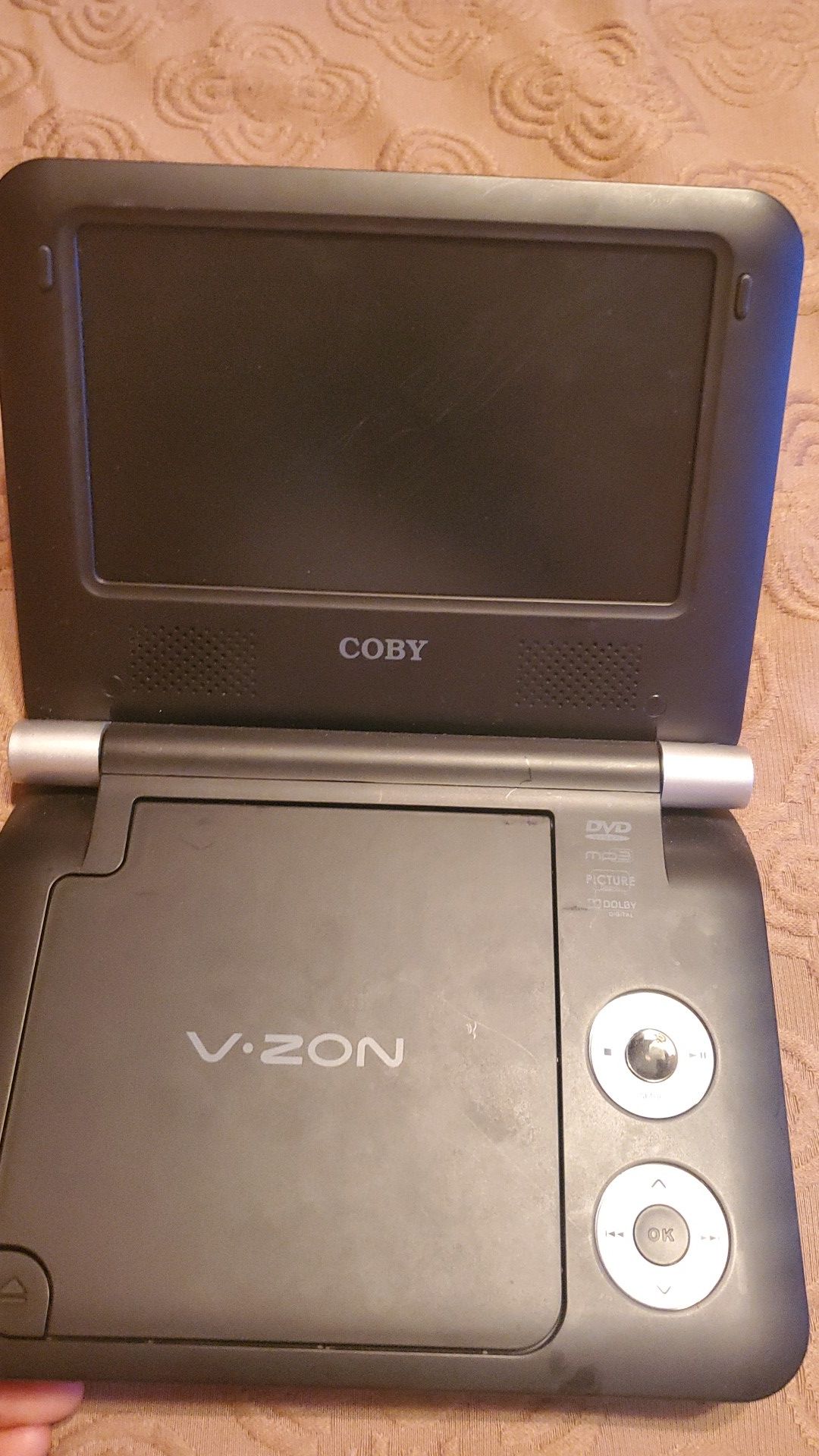 COBY V-ZON 7" Portable DVD Player w/Adapter Color Silver