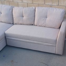 Sectional Pull Out Sleeper And Chaise With Storage
