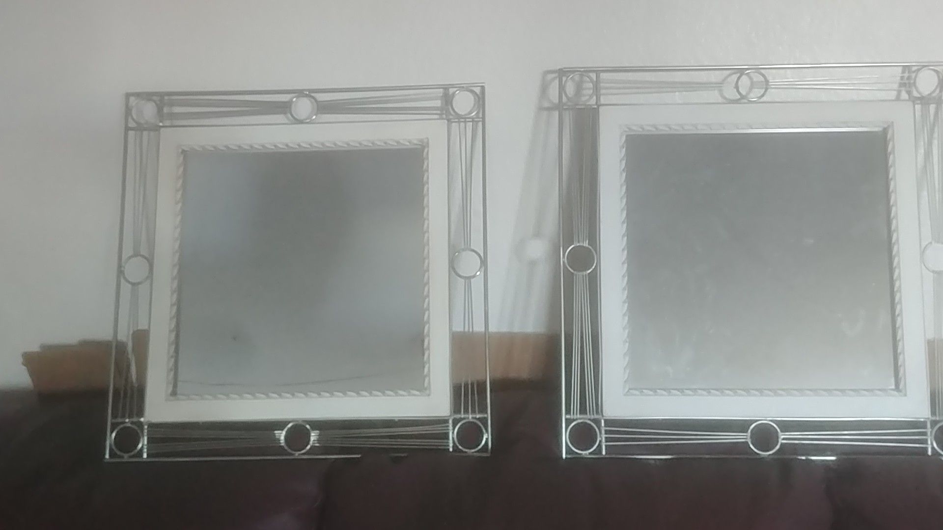 Mirror; metal frame