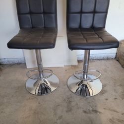 Pair of faux leather bar stools