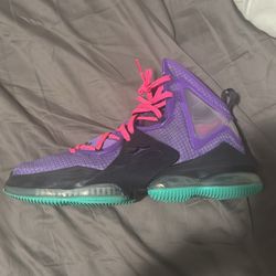 Nike LeBron 19 "DJ Bron" basketball shoe in the Wild Berry colorway. 