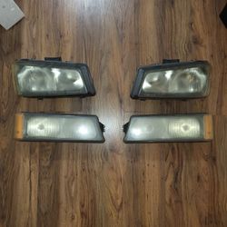 Replacement 4 Pc. Headlights & Park Signal Lamps Compatible with 2004-2006 Silverado Fleetside Chevy Pickup.  