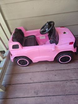 Pink kidd car.