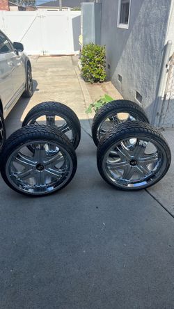 22" rims and tires brand new. OBO