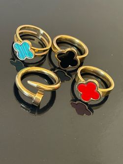 4 pieces of Gold-Tone Red Clover Ring
