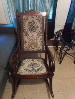 Antique Wood Rocking Chair with Floral Upholstery