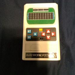 Retro Handheld Electronic Football Game.