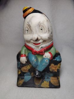 Vintage cast iron Humpty Dumpty coin bank