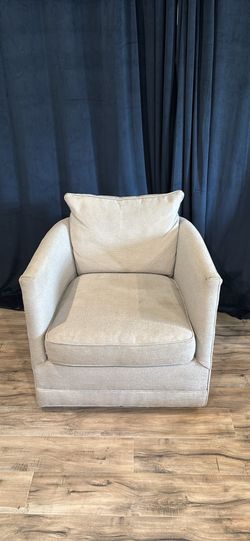 Grey swivel chair