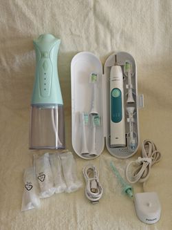 Moving sale! Philips Sonicare electric toothbrush set, toothbrush heads,water flosser