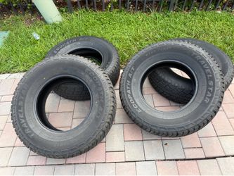 (4) 33 inch Travelstar EcoPath A/T Tires – P285/70R17 117T