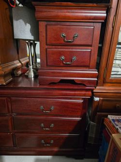 Cherry wood dresser, mirror and nightstand set.