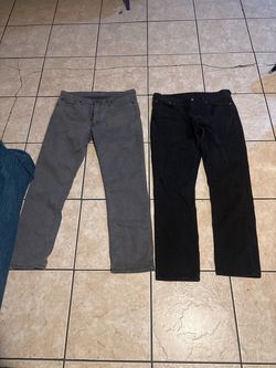 Two Pairs of Men's Jeans Gray and Black Levi’s both w36 and length 32