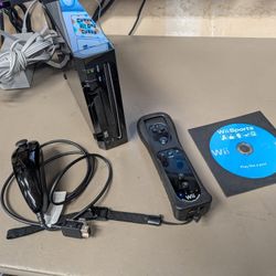 Black Nintendo Wii with one motion plus controller, nunchuck and Wii sports