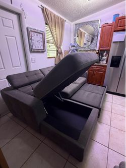 Sleeper couch adjustable headrest