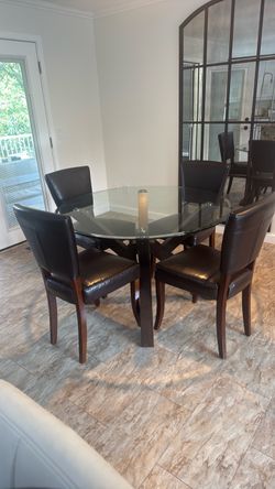 Dinning Table & 4 leather chairs