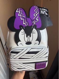 New with tags glow in the dark  Minnie Mouse  laungefly  bag