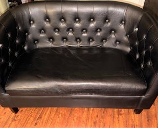 Black leather 2 seater couch