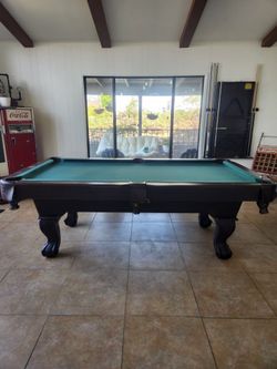 Pool table, cues, and rack