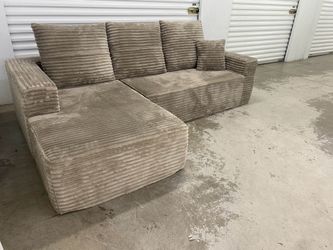 Beige bonless couch