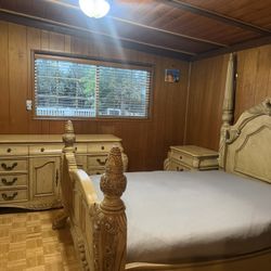 Bed Frame With Two Side Tables, Mirror, and Vanity