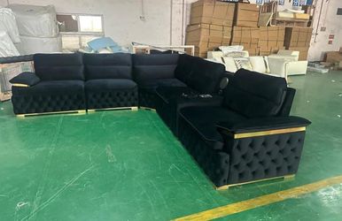 Luxury sectional sofa with speaker and wireless charger.