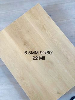 6.5MM 100% WATERPROOF SPC RIGID CORE LUXURY VINYL PLANK LONG 60”PLANK FLOORING WITH PAD ATTACHED. GREAT FOR KIDS AND PETS . ON HAND ! READY 4 Pk Up