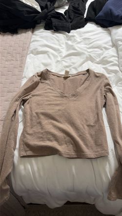 Tan color shirt size large.