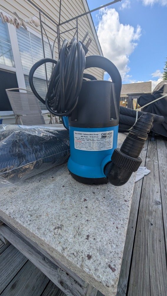 Sump pump and 50 ft of hose