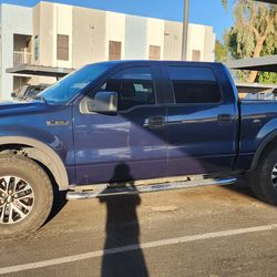 Ford f150 -05 in good condition,black leather seats in good condition to