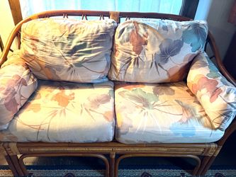 Vintage bamboo and rattan love seat.