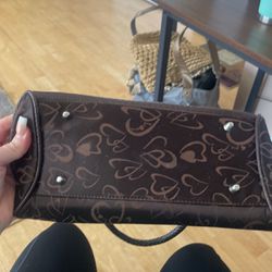 Brown purse With silver buckles 