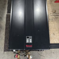 2 Rinnai Tankless Gas Water Heaters LIKE NEW!