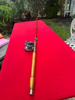 Vintage “Two-Eye” Bamboo Rod Paired With Penn 149 Mariner Reel - Classic Wall Decor