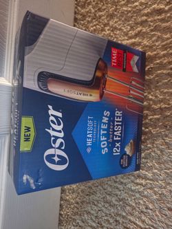 Brand new Oster 270-Watt Hand Mixer with HeatSoft Technology