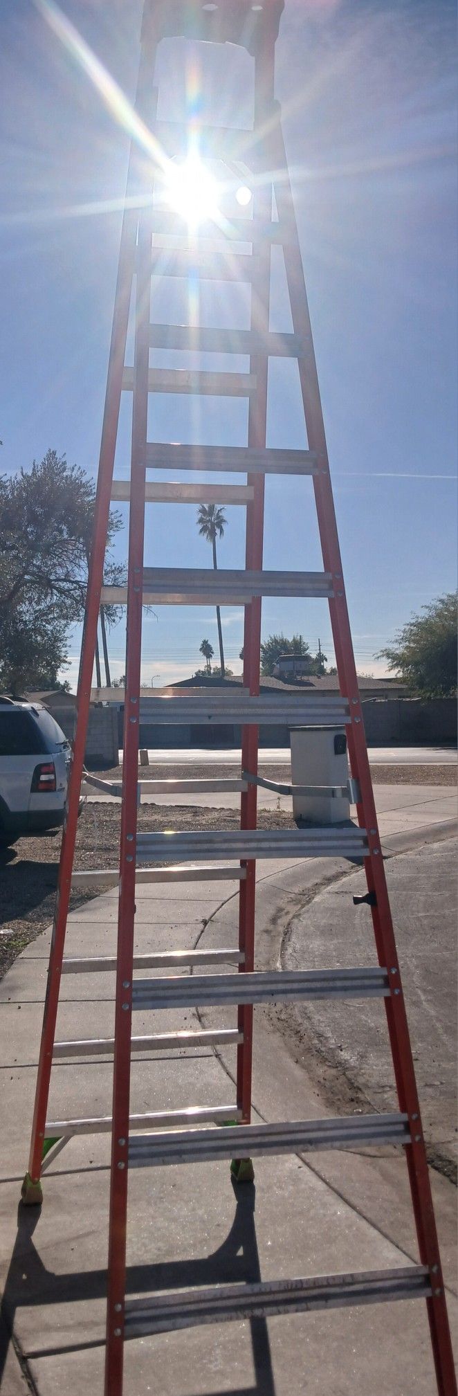 Louisville Ladder 12 ft. Fiberglass Cross-Step Ladder, model FXS1512.