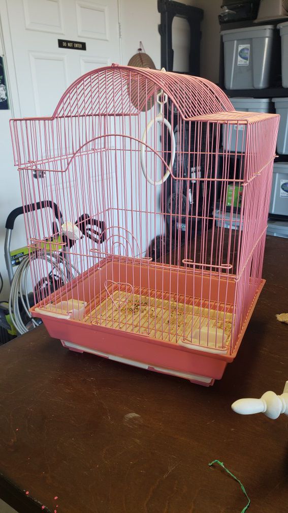 Pink bird cage