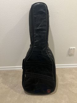 Leather guitar soft case.