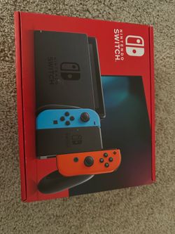 Nintendo Switch with Neon Blue and Neon Red Joy-Con