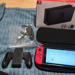 Nintendo switch with brand new docking station, Zelda case, Joycon grips and hdmi And Memory Card