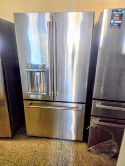 Ge cafe frech Doors Refrigerator Stainless Steel Cabinet Deep with hot water and the door warranty Financing With Snap If You Qualify Like New Conditi