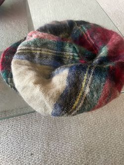 A vintage-style wool winter beret or slouchy hat Mohair Or A Wool Blend