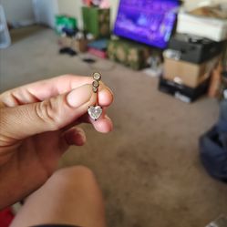 Belly button piercings and a nose ring