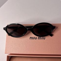Miu Miu Women’s Glasses 