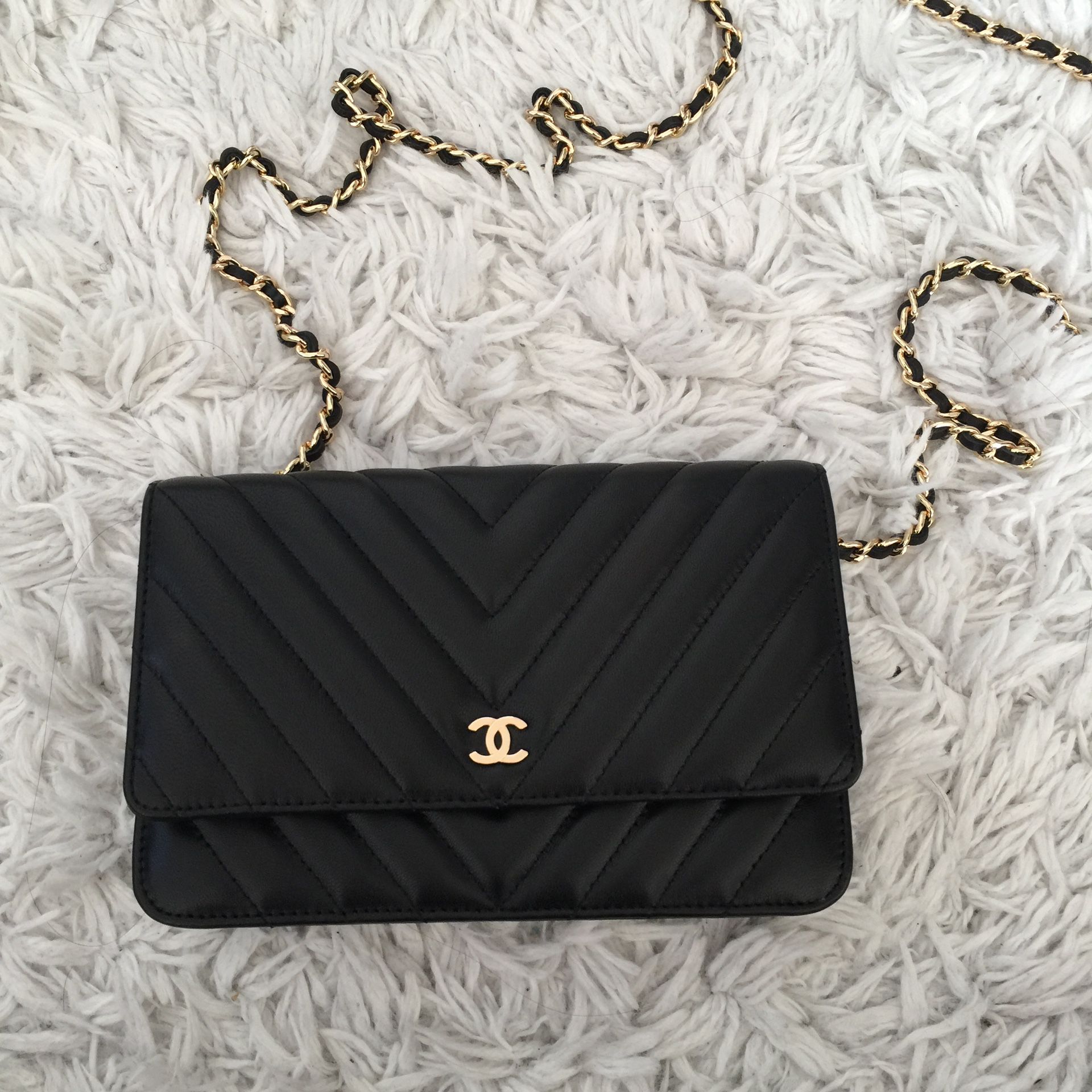 Authentic Chanel black leather WOC crossbody bag